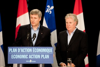 Stephen Harper and Jean Charest at a press conference in Chelsea, Qc.