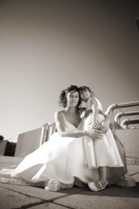 Bride and bell girl posing